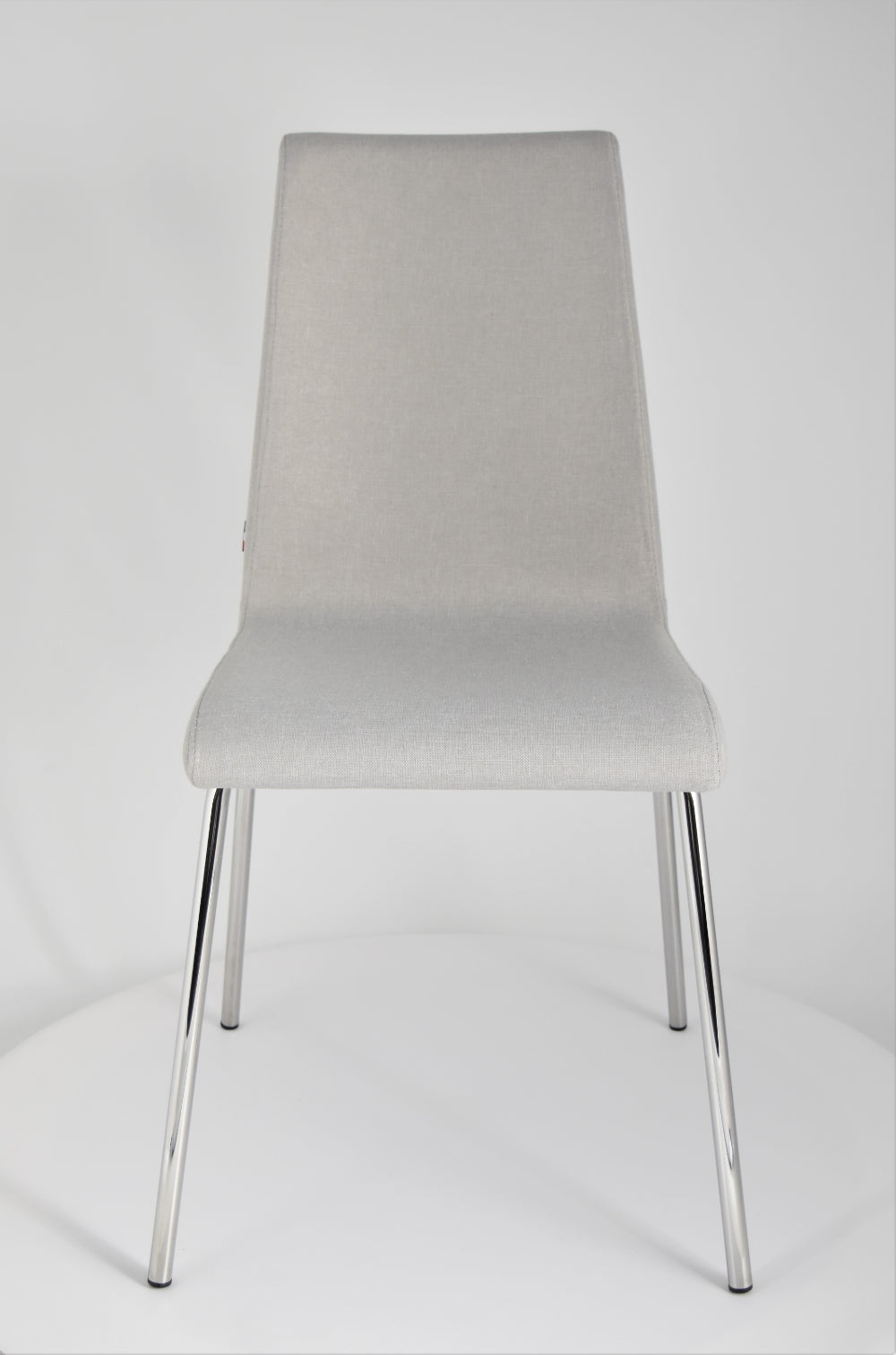 Chairs LISBONA with steel legs and seat in multilayer wood, upholstered in fabric colour pearl grey