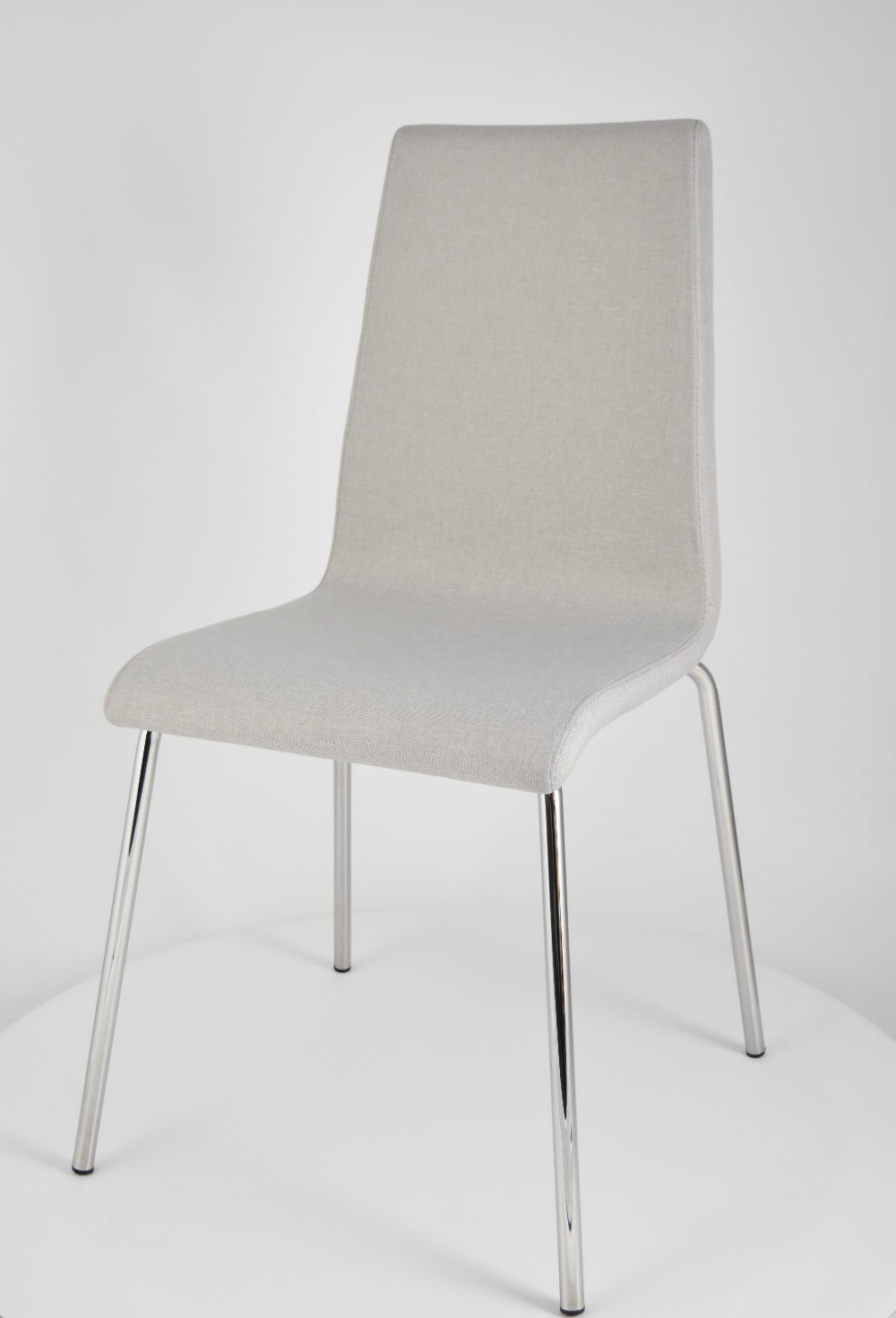 Chairs LISBONA with steel legs and seat in multilayer wood, upholstered in fabric colour pearl grey
