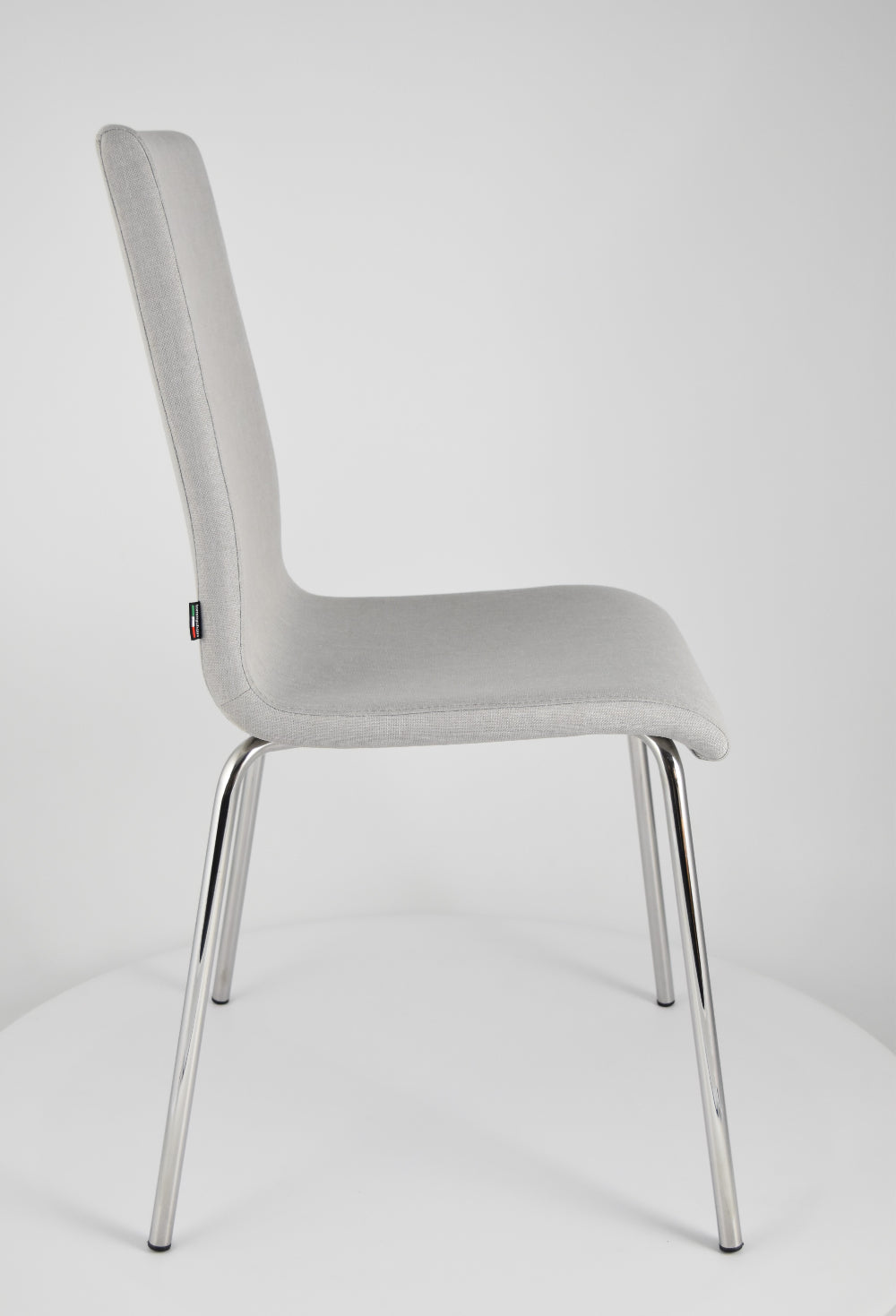 Chairs LISBONA with steel legs and seat in multilayer wood, upholstered in fabric colour pearl grey