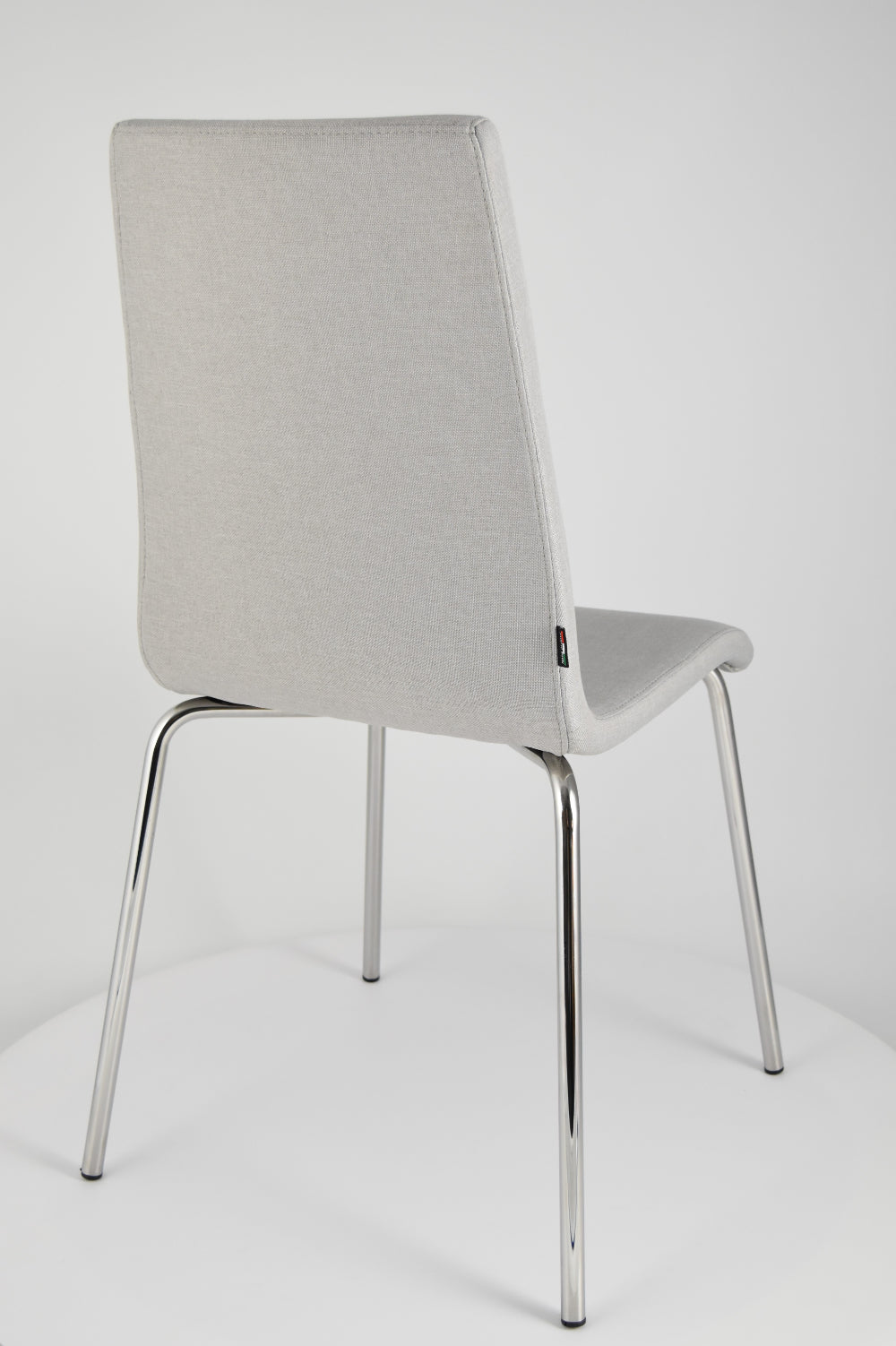 Chairs LISBONA with steel legs and seat in multilayer wood, upholstered in fabric colour pearl grey